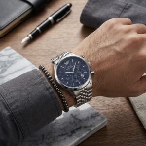 ⁦ ساعة يد رجالية  IBSO بلمساتها فضية بمينا كحلي فاخر