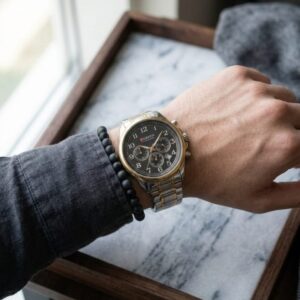 ساعة يد CURREN رجالية تتناغم مع لونين فضي وذهبي ومينا اسود