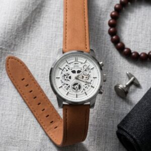 ساعة يد IBSO رجالية بسوار شمواه ترابي بتصميم أنيق